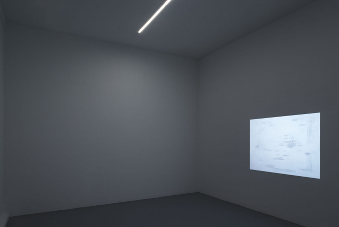 Installation view - Video projection and steel on wall, dimmable strip lights (UBS Gallery, Red Hook, NY)